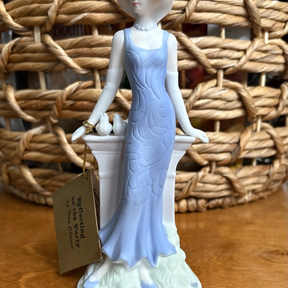 Vintage Porcelain Figurine. “Reflecting on the Party”